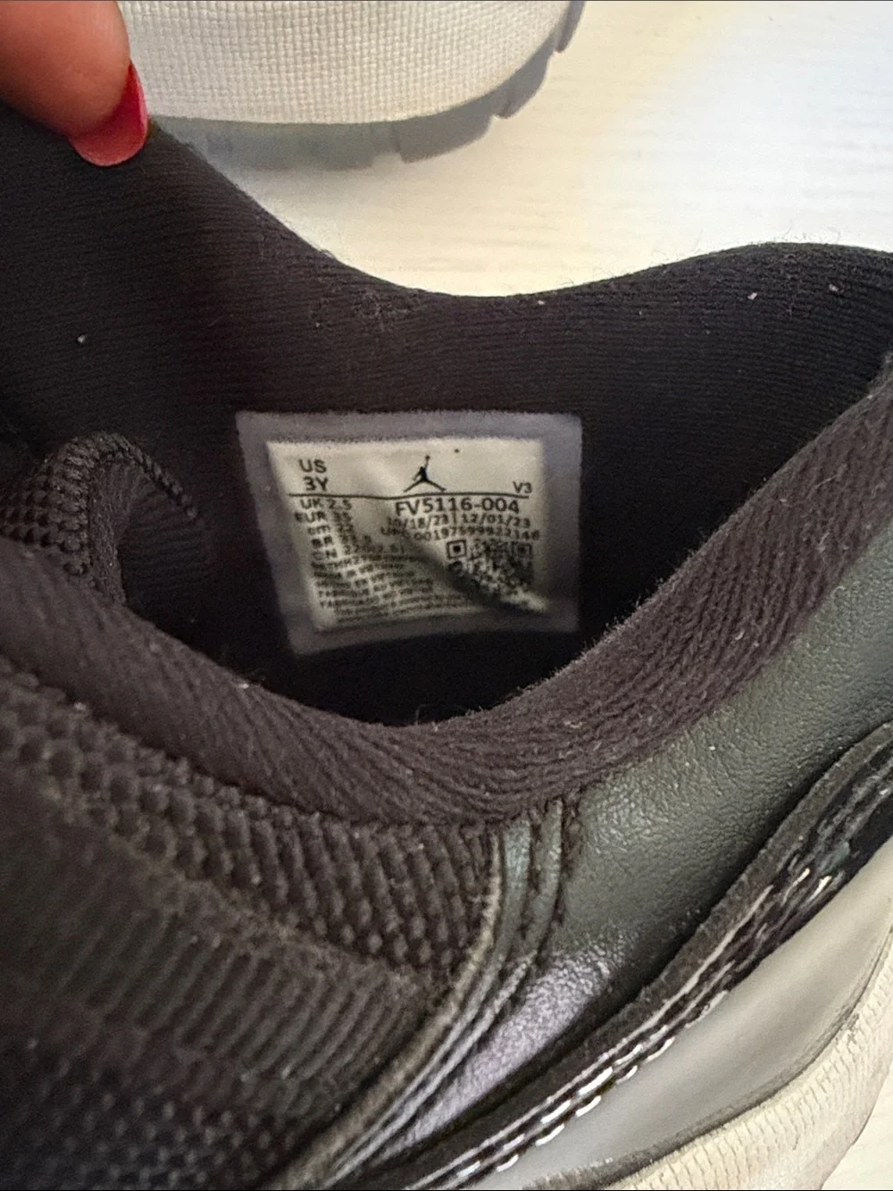 Jordan low 11’s Kids Black Basketball Sneakers with Blue Logo